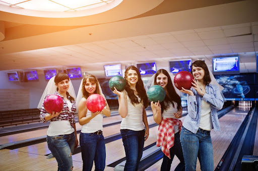 Invitations and guest management setting the stage for a memorable bowling bash