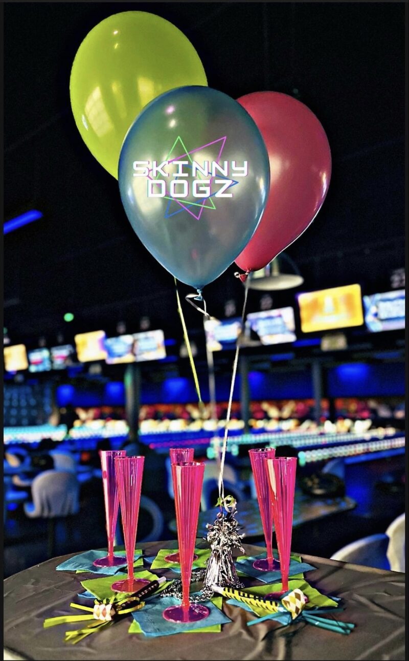 Guests celebrating a birthday party indoors at Skinny Dogz in Ogden, Utah